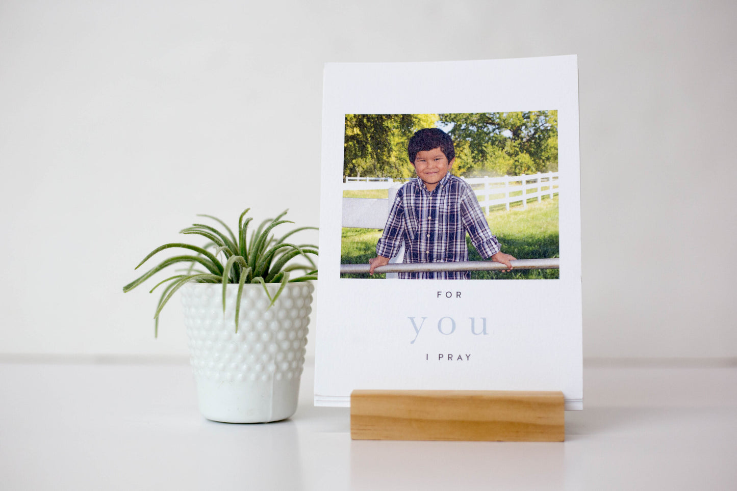 A personalized prayer on a card in a wooden display stand handmade to place in your home decor to serve as a reminder to pray for your son to the Lord God which is a great baptism gift or mother's day gift for a new mom