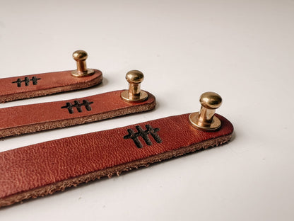 Handcrafted with American Saddle leather and made by hand, this leather bracelet with brass closure is to remind men and women to pray always.